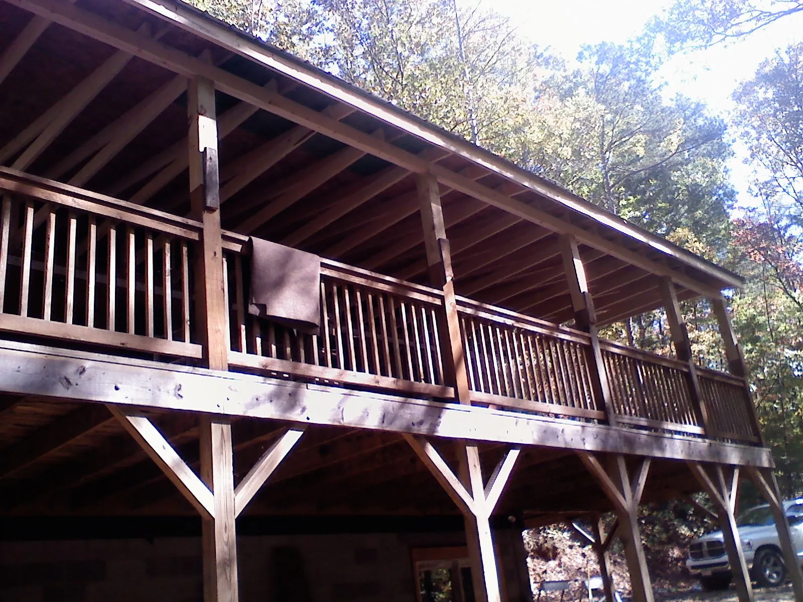 Timber framing under a new elevated porch and deck — Roof Leak Repair in Coos Bay by Roofing Brothers